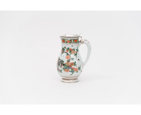 A famille verte ewer and lid with European silver mountsChina, Qing dynasty, Kangxi period (1662-1722)Porcelain decorated in 