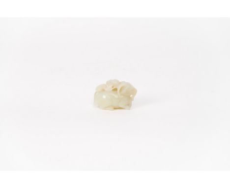 A carved pale celadon jade group of ramsChina, Qing dynasty, Qianlong period (1736-1795)Provenance: French private collection