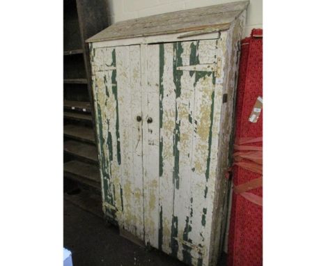 VICTORIAN PINE PAINTED CUPBOARD WITH SLOPED TOP AND TWO CUPBOARD DOORS WITH BRASS BUTTON HANDLES 