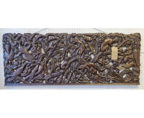 CARVED PANEL, mid 20th century rectangular hardwood carved and pierced with tropical birds of paradise, monkeys and other cre