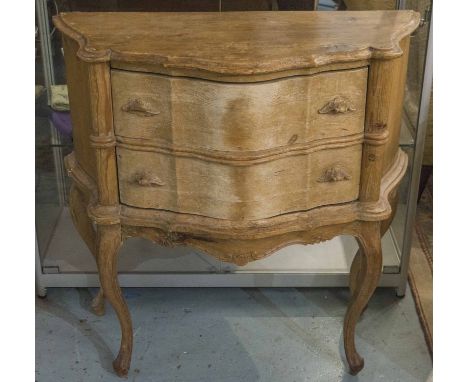 COMMODE, 19th century Continental pine of serpentine outline with two drawers below on slender cabriole supports, 83cm W x 81