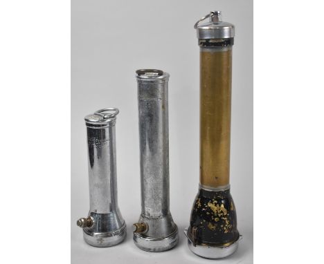 A Collection of Three Vintage Graduated Cylindrical Torches, the Tallest 30cm High 