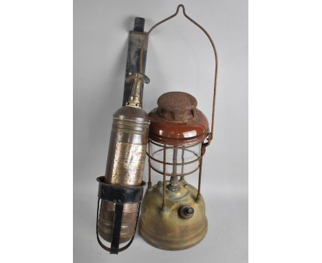A Vintage Hurricane Lamp Together with a Vintage Quelfire Fire Extinguisher in Unrelated Stand 