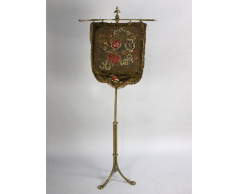 A Late Victorian Gilt Metal Pole Screen with Needlework Tapestry Shield Shaped Banner on Chased Pole with Tripod Base and She