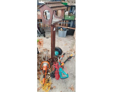 Wooden birdhouse along with a steel HSE 71 hedgetrimmer, electric strimmer and other tools 