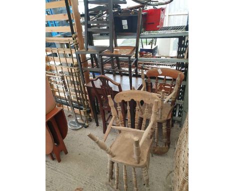 4 stick back dining chairs along with a side table and other furniture