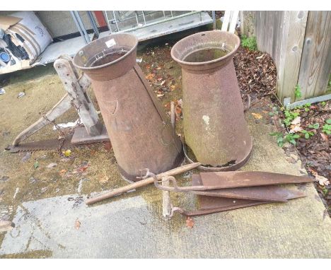 2 metal vintage milk churns along with tools
