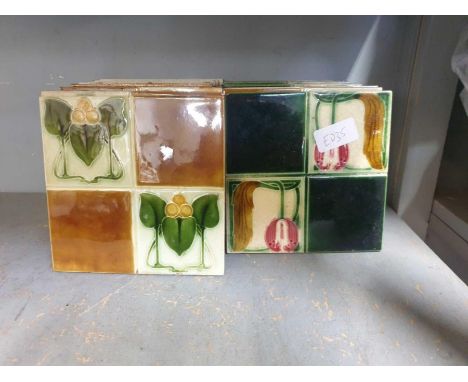 Collection of Art Nouveau style glazed ceramic tiles
