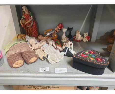 Collection of vintage dolls and cats
