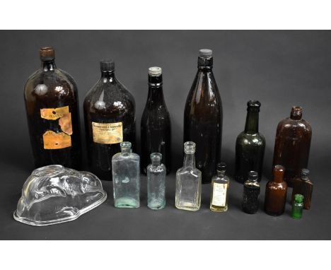A Collection of Vintage Veterinary, Medical and Brewery Bottles Together with a Glass Rabbit Mould 