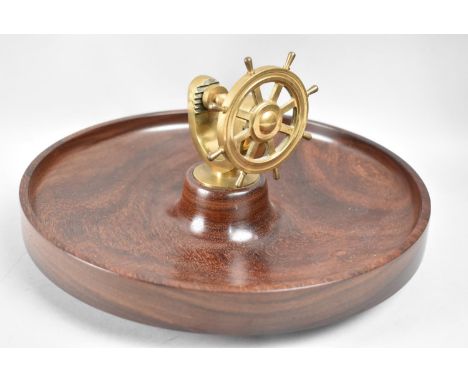A Mid 20th Century Wooden Nut Bowl with Centre Raised Novelty Nut Cracker in the Form of a Ships Wheel, 29cms Diameter 