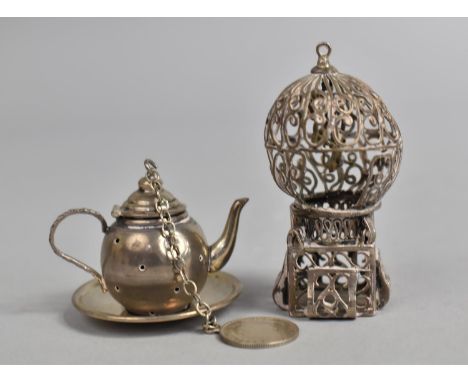 A Silver Diffuser in the form of a Teapot with Republic of Colombia Diez Centavos Coin Mount Together with a White Metal Fili