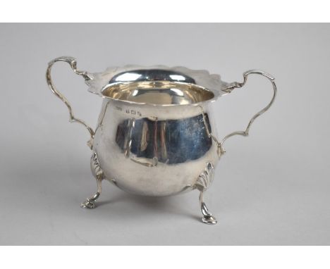 An Edwardian Silver Two handled Sugar Bowl on Three Scrolled Feet, Birmingham 1907, 9cm high 