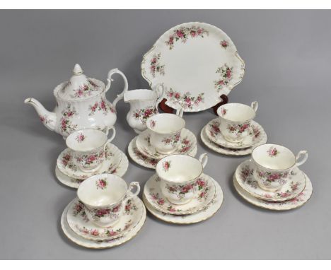 A Royal Albert Lavender Rose Tea Set to comprise Tea Pot, Six Cups, Milk Jug, Cake Plate, Six Saucers and Six Side Plates 