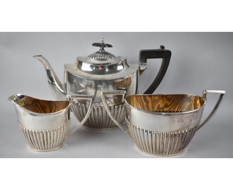 An Edwardian Walker and Hall Three Piece Silver Plated Tea Service 