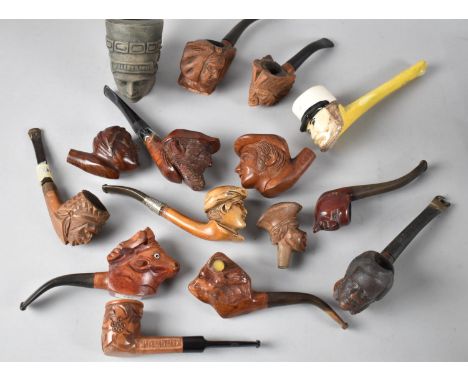 A Collection of Carved Wooden and Novelty Pipes and Pipe Bowls 
