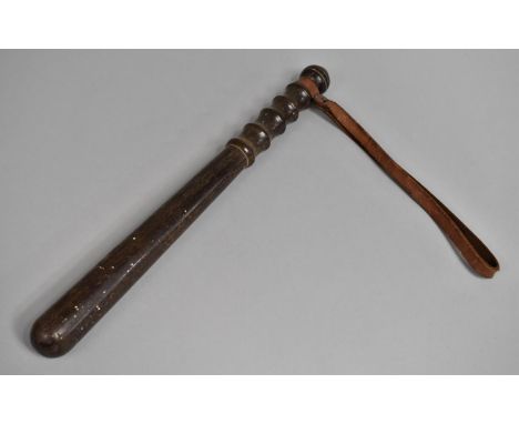 An Early/Mid 20th Century Turned Wooden Truncheon with Leather Strap, 39cms Long 