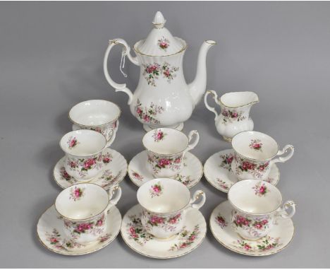 A Royal Albert Lavender Rose Coffee Set to comprise Coffee Pot, Six Cans, Saucers, Milk Jug and a Sugar Bowl 