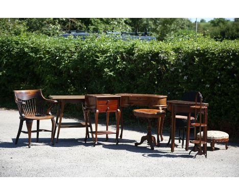 A collection of furniture comprising a 1930s captains chair, an Edwardian two-tier occasional table, a two drawer side table,