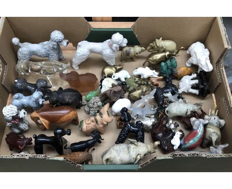 A large collection of ceramic, cast metal and glass animals, to include:- poodles, elephants and others, all A/F (qty)