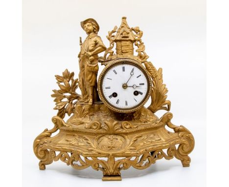 A late 19th Century French spelter and gilt mantle clock, Roman numerals, to a white enamelled dial with a farmer figure and 