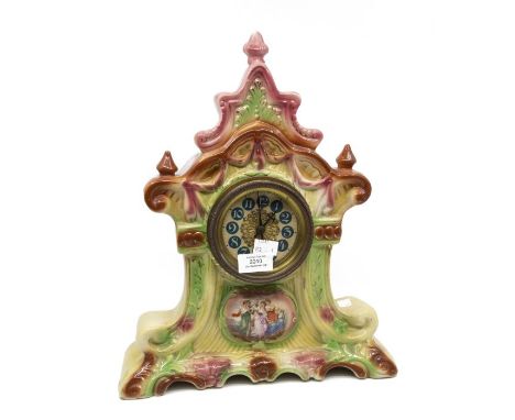 Early 20th Century ceramic clock, heavily glazed with ladies dancing transfer to front