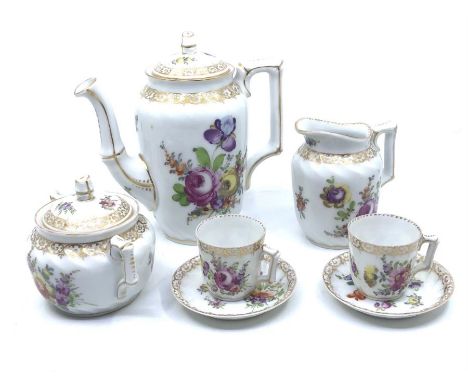 A late 19th/early 20th century part tea service by R. Grossbaum &amp; Söhne, Dresden comprising:- a teapot, sugar bowl, milk 