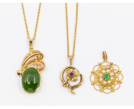 An emerald and pearl set 9ct gold pendant, comprising a central round cut emerald within a border of half pearls, with a wire