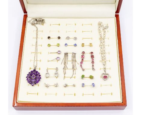 A collection of silver jewellery comprising silver and gem set jewellery, to include tanzanite, opal, quartz, tourmaline and 