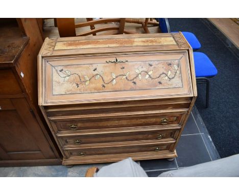 A converted dresser base/ bureau in the 'Chabby chic' manner with pull down door above three drawers and supported on bun fee