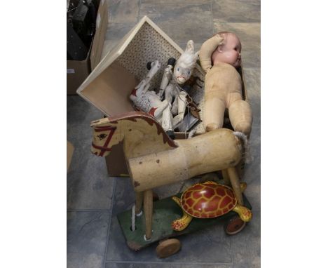 Toys - a pull-along wooden horse; Armand Marseille doll; wooden horse puppet; tin-plate Mobo toy tortoise; Schuco cow; etc; s