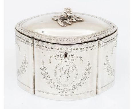 A Georgian style shaped oval silver tea caddy and cover, the body engraved with ribbon tied oval cartouches and fern decorati