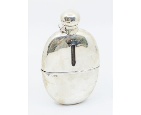 A late Victorian large silver mounted glass hip flask, curved body with detachable cup, all hallmarked by William Hutton &amp