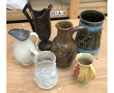 A collection of ceramic jugs, to include:- a creamware example with a pewter lid; a stoneware example; a P&amp;K Corinth vase