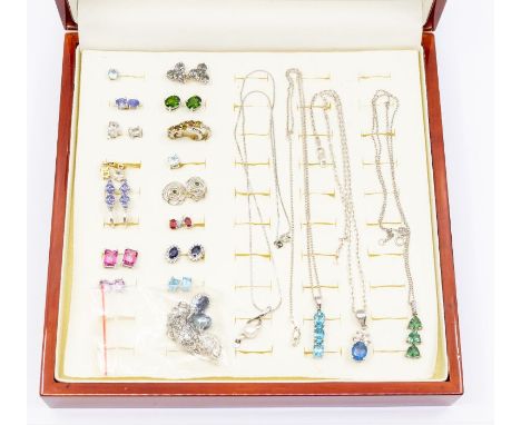 A collection of silver jewellery comprising silver and gem set jewellery, to include ruby, &nbsp;tanzanite, opal, tourmaline,