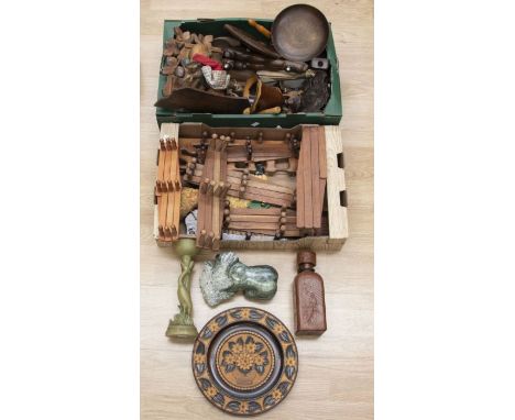 A quantity of treen items including shoe lasts, a wall bracket modelled with a stag's head, Pelham puppet etc