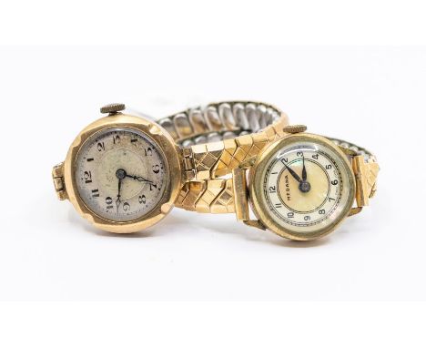 An early 20th century ladies 9ct gold cased watch, round silvered dial with number markers on later plated expander strap, al