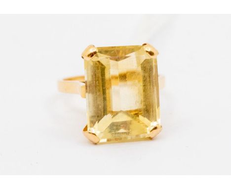 An citrine and 18ct gold ring, comprising a rectangular cut stone approx. 12 x 15mm, claw set, size K, unmarked assessed as 1