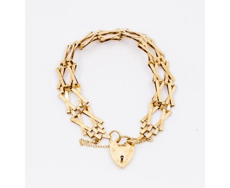 A 9ct gold fancy link gate bracelet, width approx 12mm, length approx 18cm, padlock clasp and safety chain, weight approx 16g