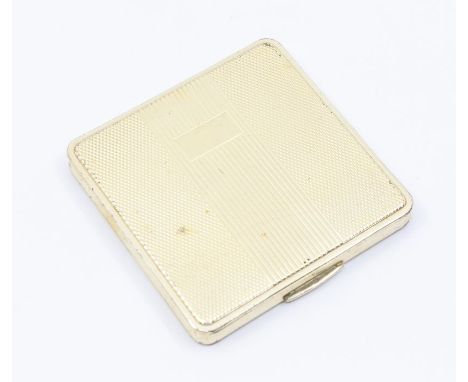 A Modern silver gilt square shaped compact with fitted interior by Kigu Ltd, London, 1973, gross 3.70 ozt (wear to exterior c