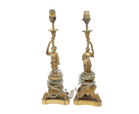 A pair of Italian style gilt metal table lamps, the bodies cast with Renaissance style figures on ornate tripod stands (2)&nb