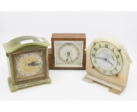 An Art Deco style marble and chrome mantel clock, the central section stamped Garrard Le Coultre Swiss (feet loose in setting