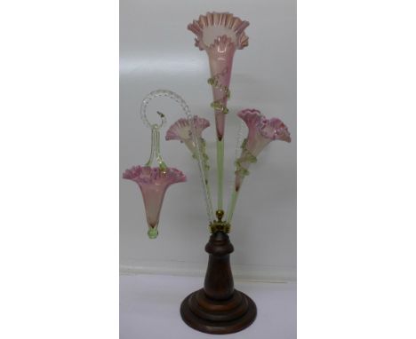 A Victorian five trumpet glass epergne with a replacement wooden base