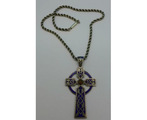 An enamel Celtic cross pendant on chain, height of cross 6cm