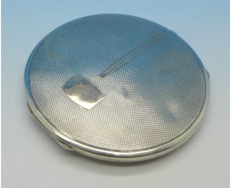A silver Art Deco compact with gold inlay, 86g