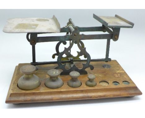 A set of postal scales with four weights
