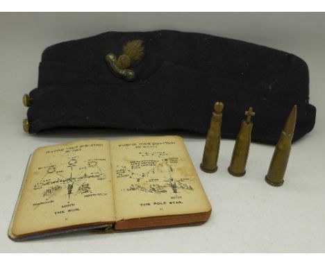 A Royal Engineers cloth cap, three trench art bullets and The Soldiers Own Diary