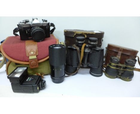 A Fujica STX-1 35mm film camera and lens, an additional f80-200mm lens and flash gun with soft case, plus a pair of Air Minis