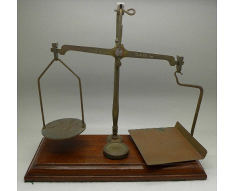 A set of postal scales marked Gray & Co., London