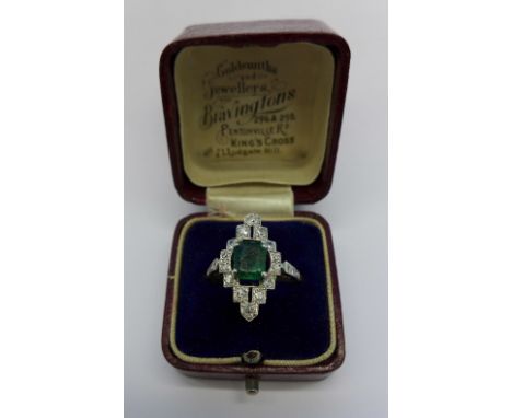 An 18ct gold and platinum set emerald and diamond Art Deco ring, 4.2g, Q, emerald 7mm x 5mm